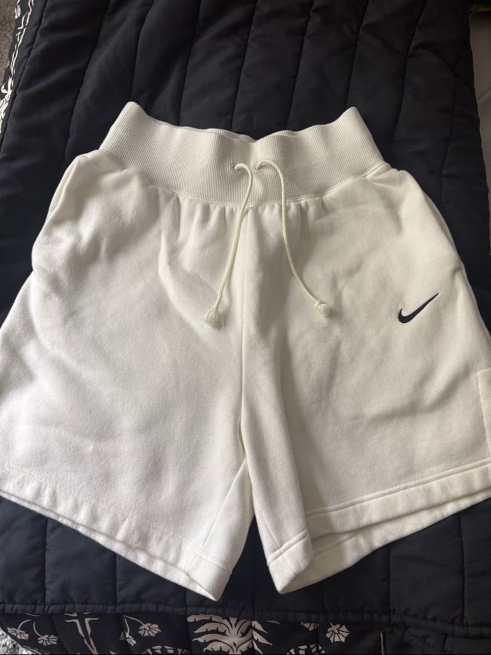Nike unisex White Athletic Drawstring Shorts with Black Swoosh pockets size S